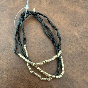 NEW W/O Tag Marilyn Schiff Three Strand Black and Gold Beaded Stretch Bracelet